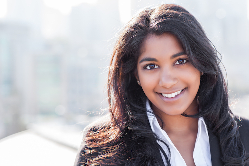 woman smiling after restorative dentistry procedure